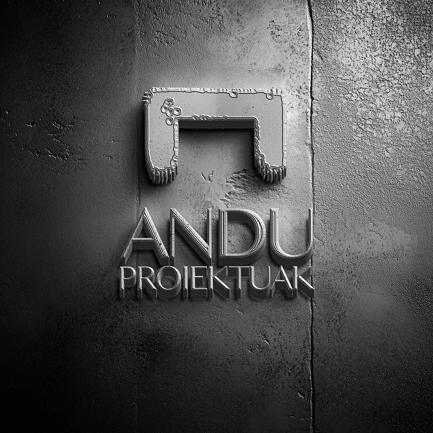 Andu Proiektuak logo in 3D relief on a textured grey stone wall, monochrome metallic finish, brand identity design.