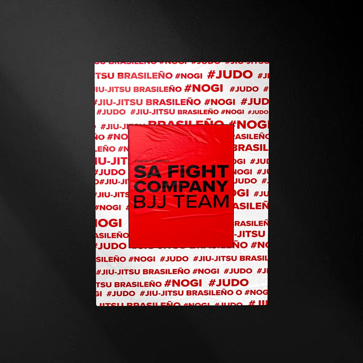 SA Fight Company poster pasted on a black wall, white background with repeated red type and a red box reading BJJ Team.