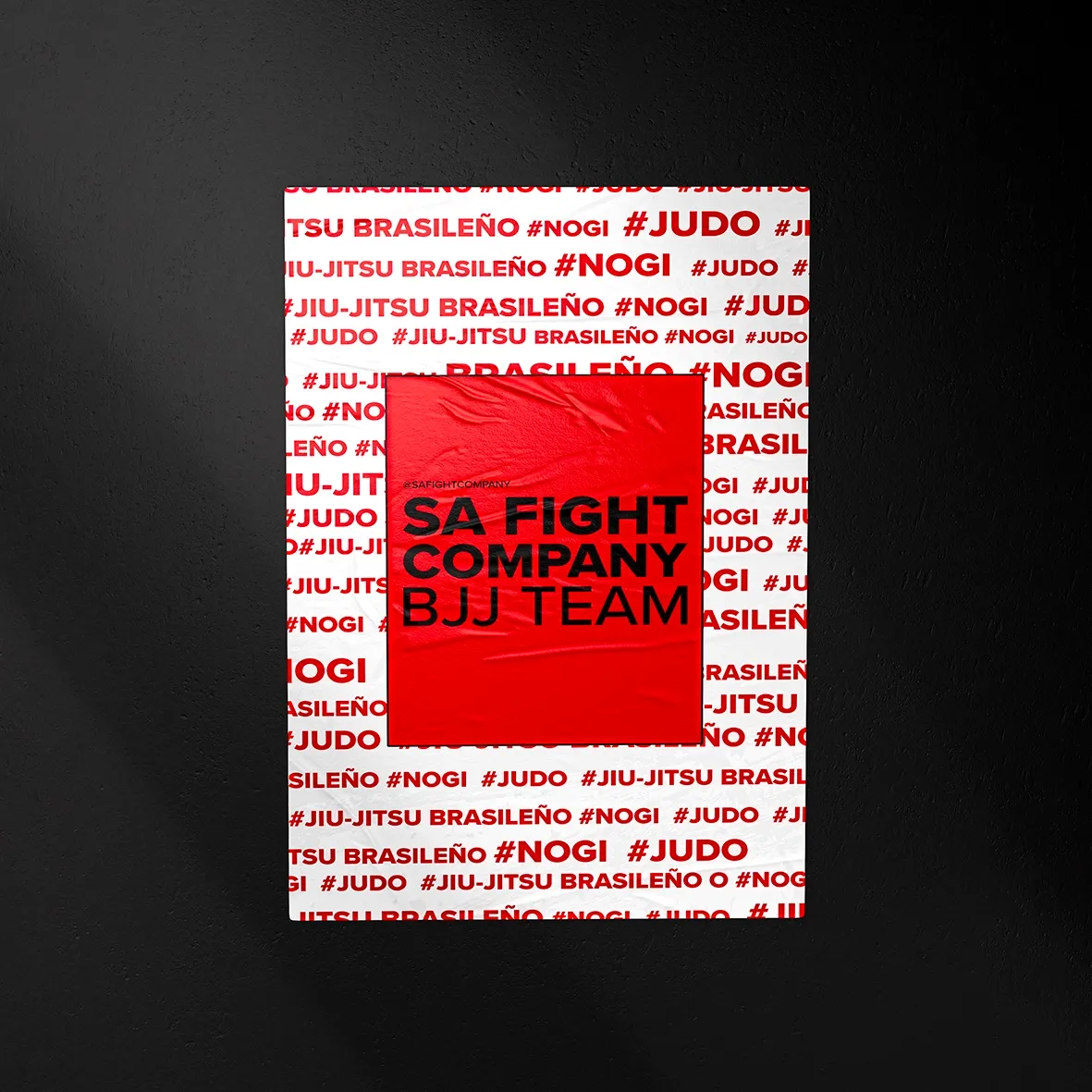 SA Fight Company poster pasted on a black wall, white background with repeated red type and a red box reading BJJ Team.